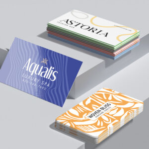 Assorted custom business cards displayed in stacks